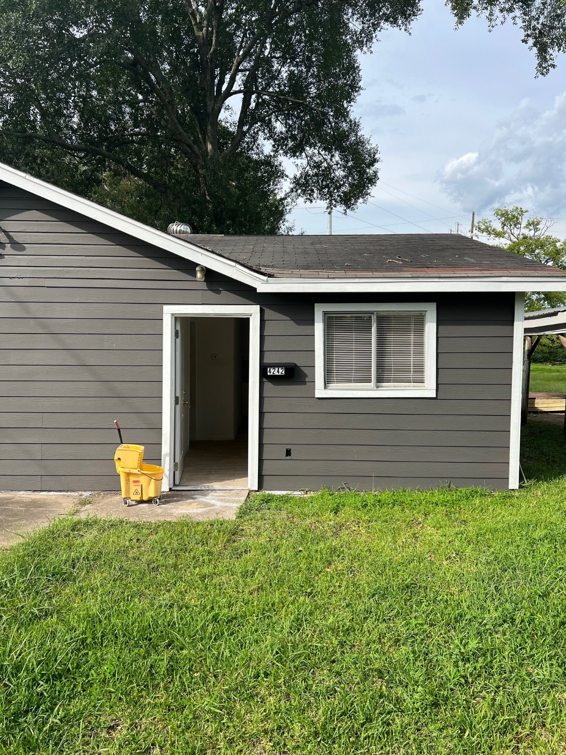 4242 10th Avenue Port Arthur, TX 77642 - Photo 2 of 13 a front view of a house with an outdoor seating
