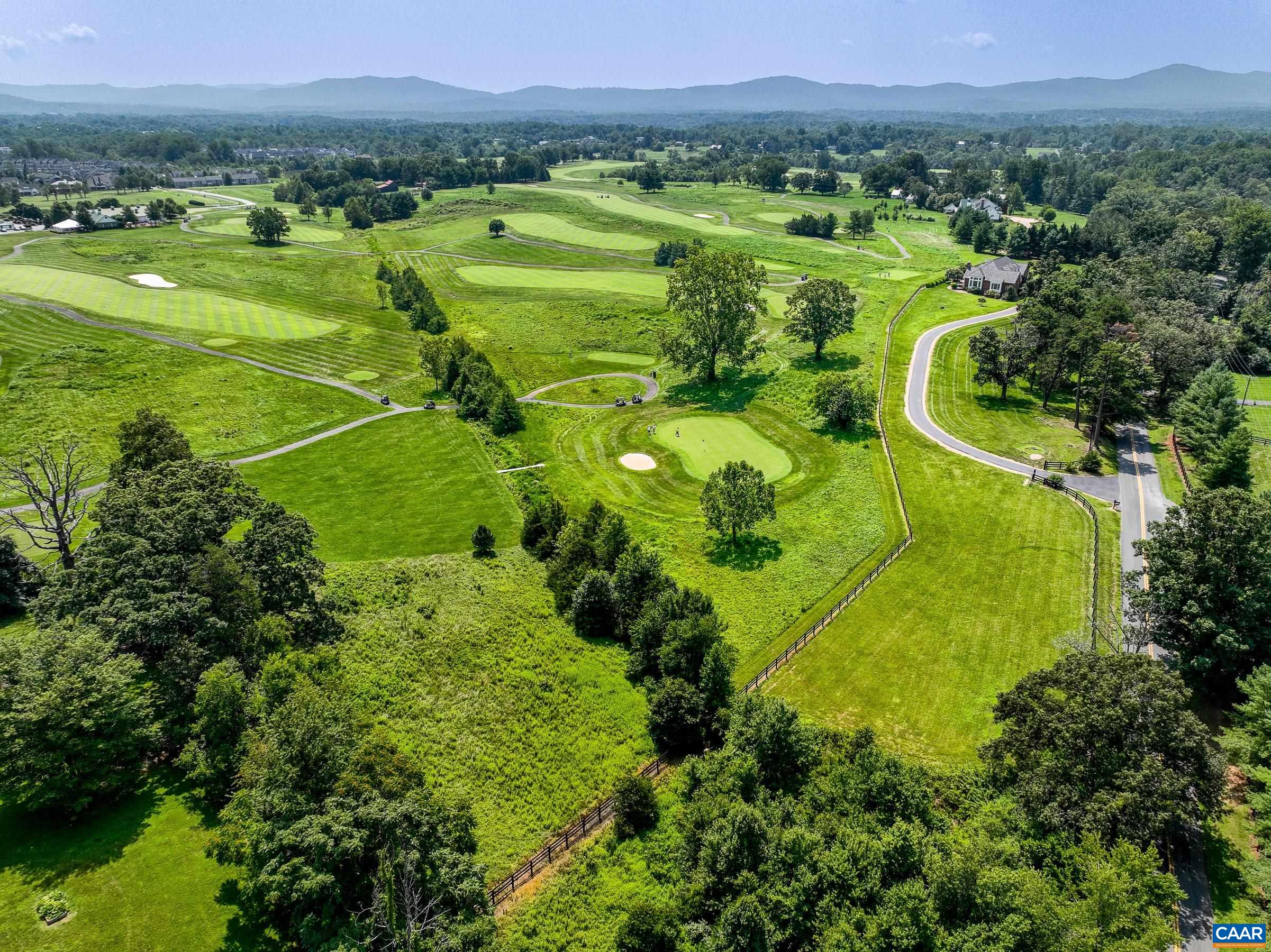 801 Half Mile Branch Road Crozet, VA 22932 - Photo 2 of 69 a view of a golf course with a swimming pool