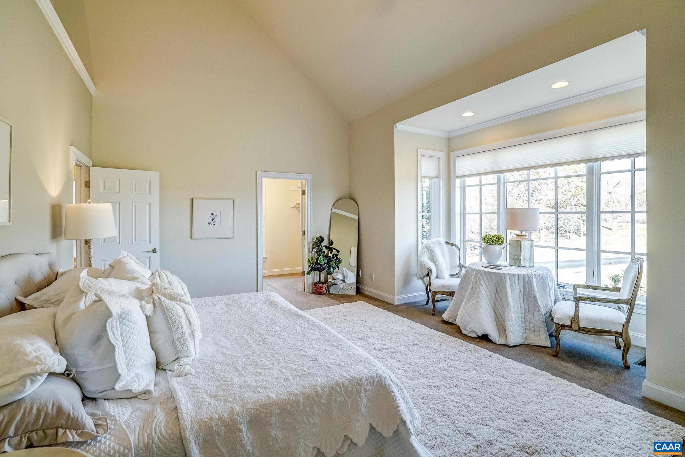 801 Half Mile Branch Road Crozet, VA 22932 - Photo 35 of 69 a bedroom with a bed and large window