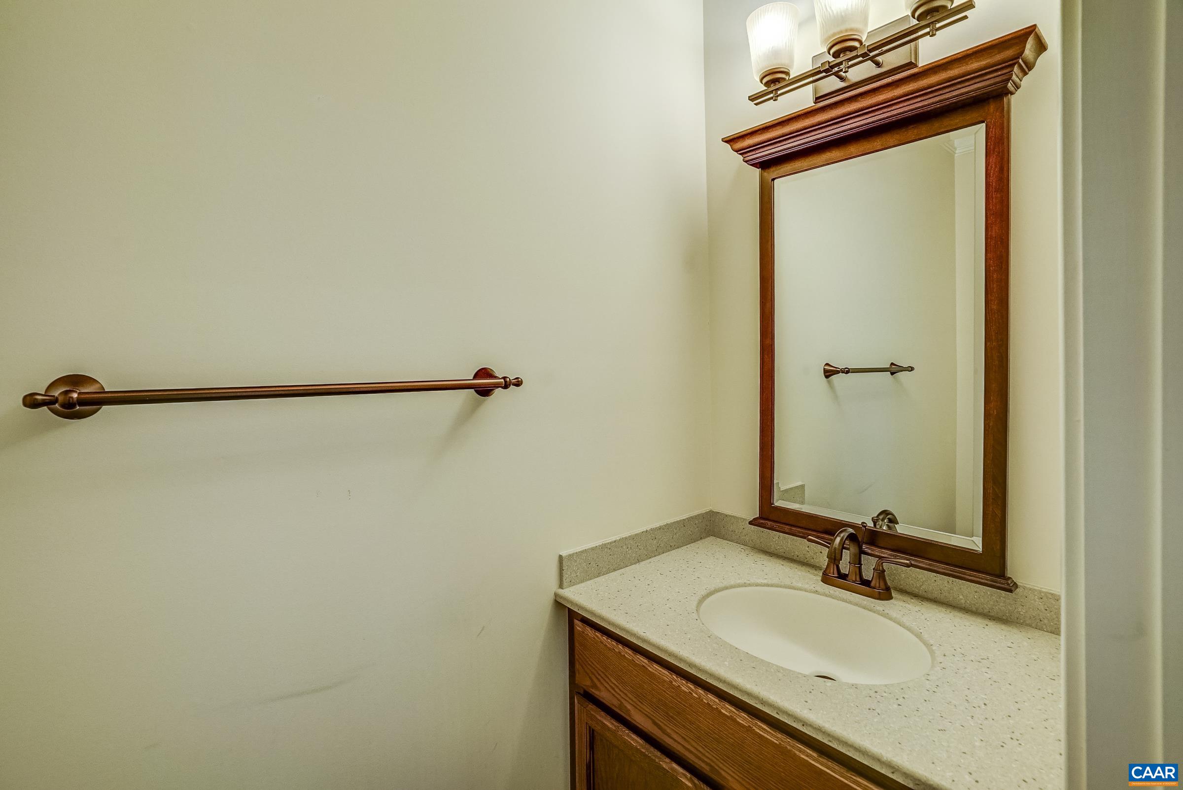 801 Half Mile Branch Road Crozet, VA 22932 - Photo 44 of 69 a bathroom with a sink and a mirror