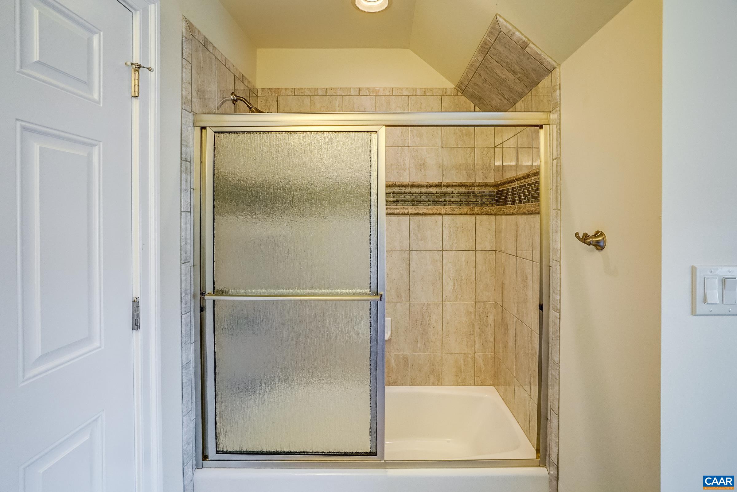 801 Half Mile Branch Road Crozet, VA 22932 - Photo 49 of 69 a bathroom with a glass shower door
