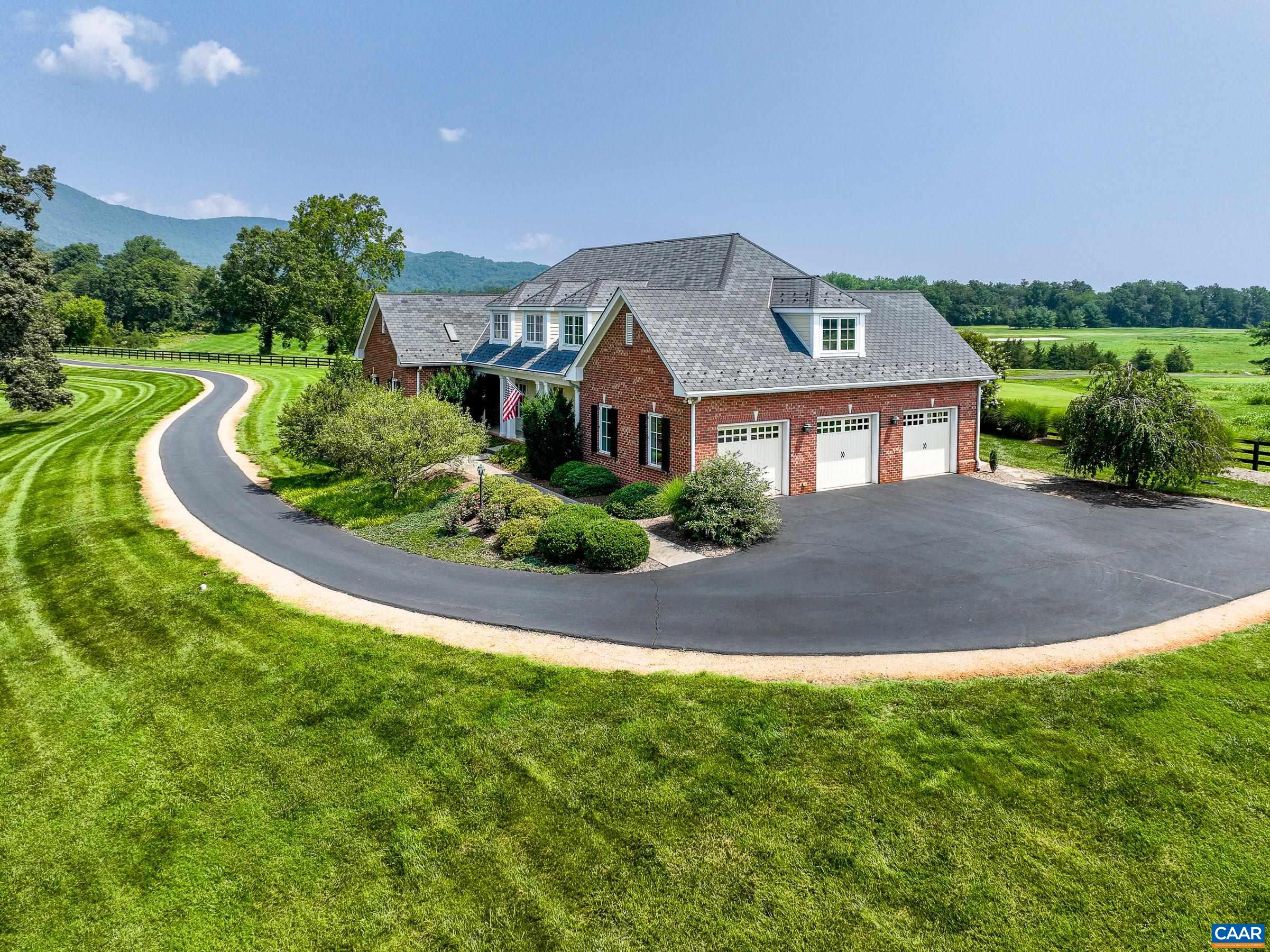 801 Half Mile Branch Road Crozet, VA 22932 - Photo 5 of 69 a front view of a house with a yard