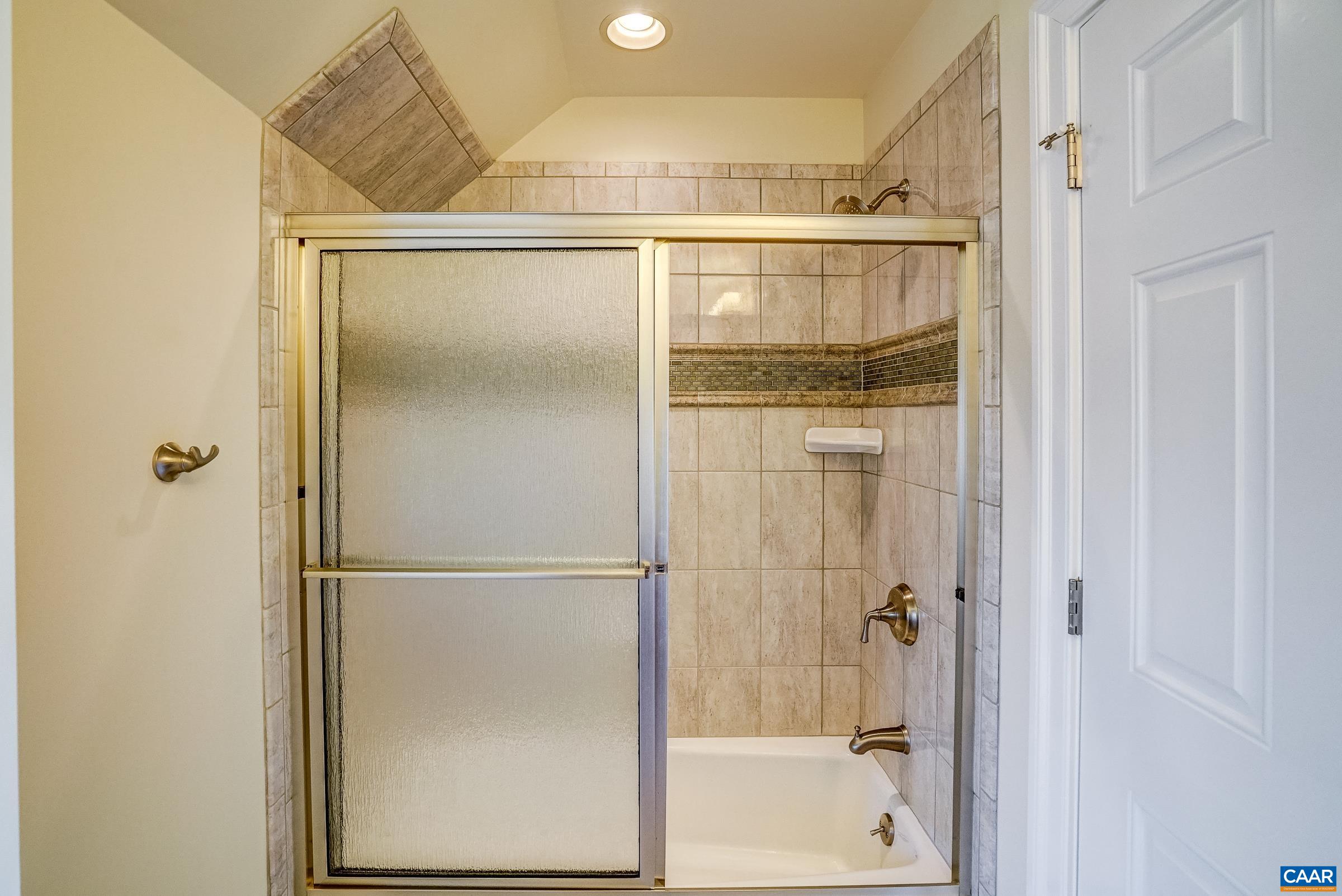 801 Half Mile Branch Road Crozet, VA 22932 - Photo 52 of 69 a bathroom with a glass shower door