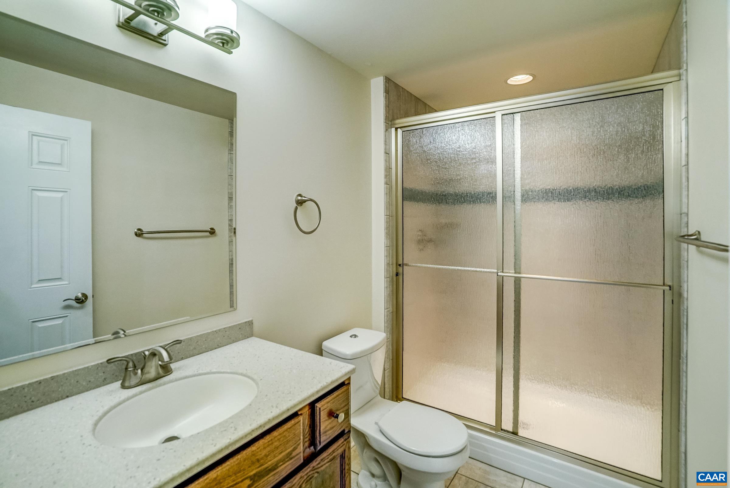 801 Half Mile Branch Road Crozet, VA 22932 - Photo 55 of 69 a bathroom with a sink toilet and shower