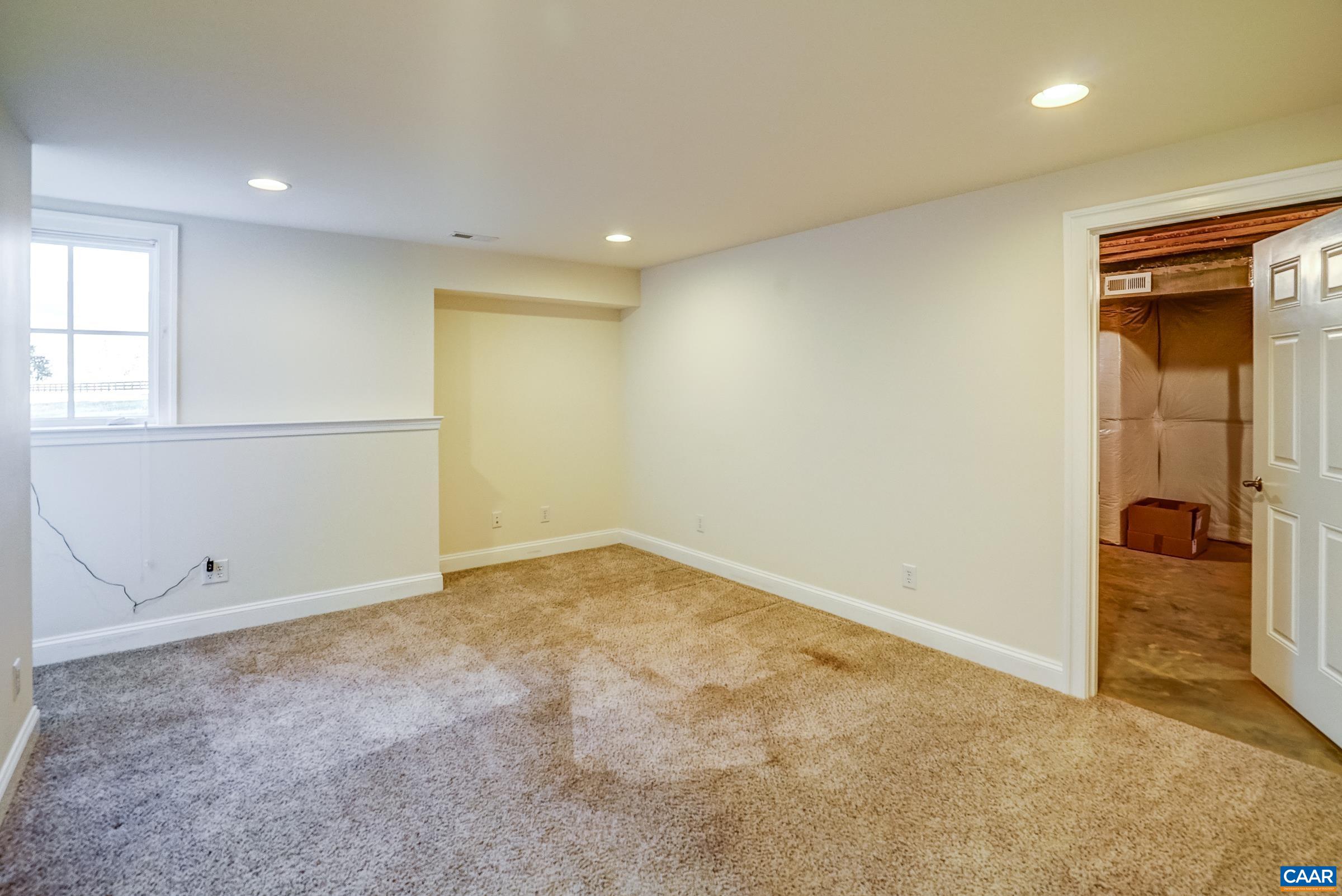 801 Half Mile Branch Road Crozet, VA 22932 - Photo 56 of 69 an empty room with closet and a window