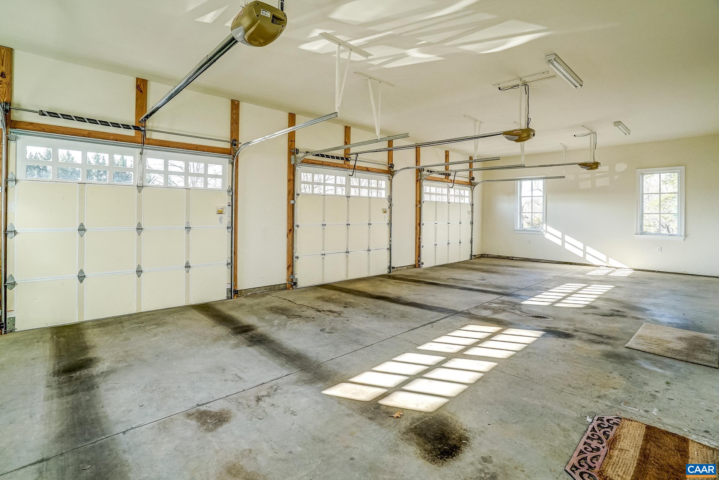 801 Half Mile Branch Road Crozet, VA 22932 - Photo 60 of 69 a view of a big room with wooden floor and windows