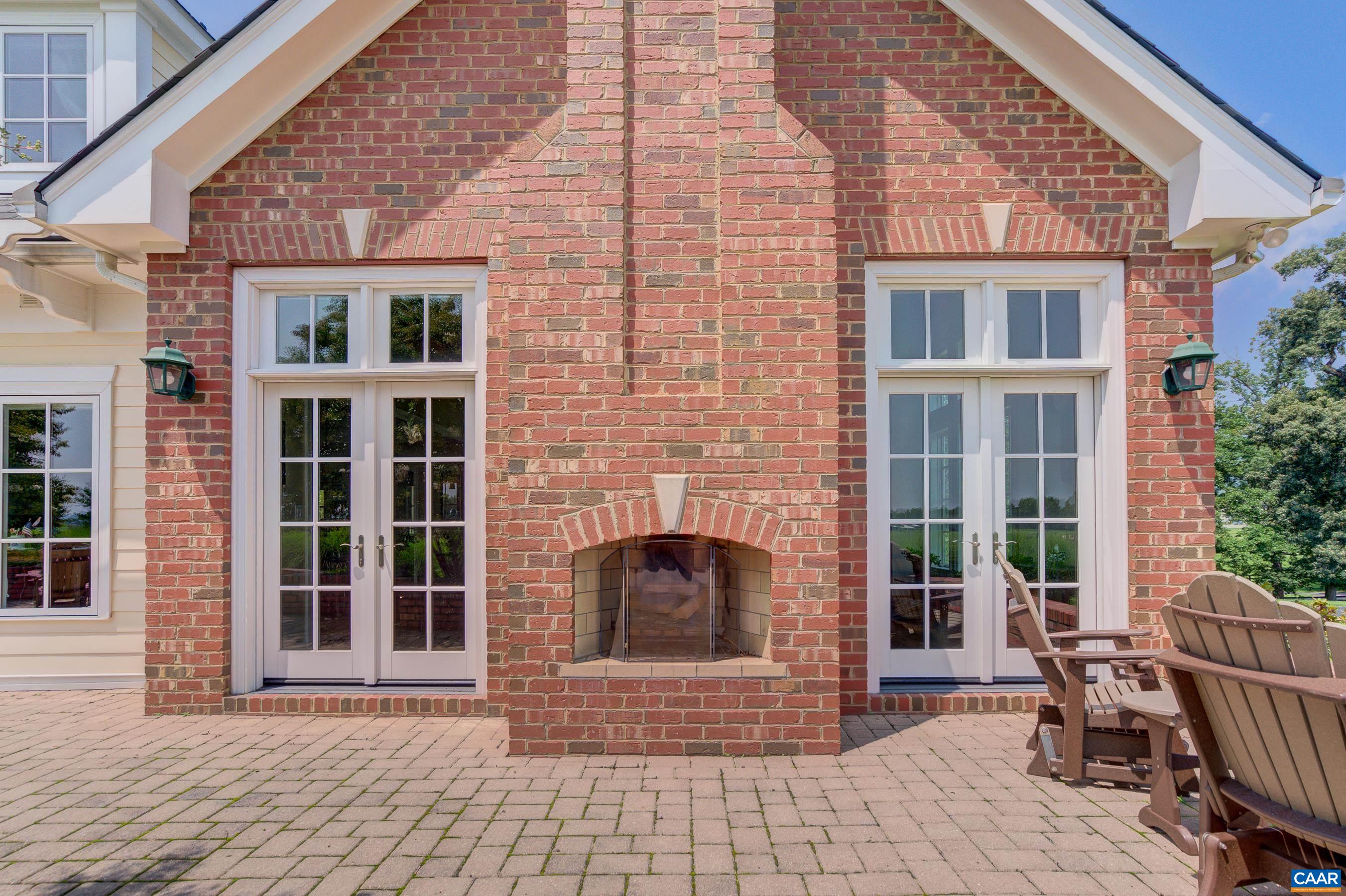 801 Half Mile Branch Road Crozet, VA 22932 - Photo 8 of 69 a front view of a brick house with outdoor space