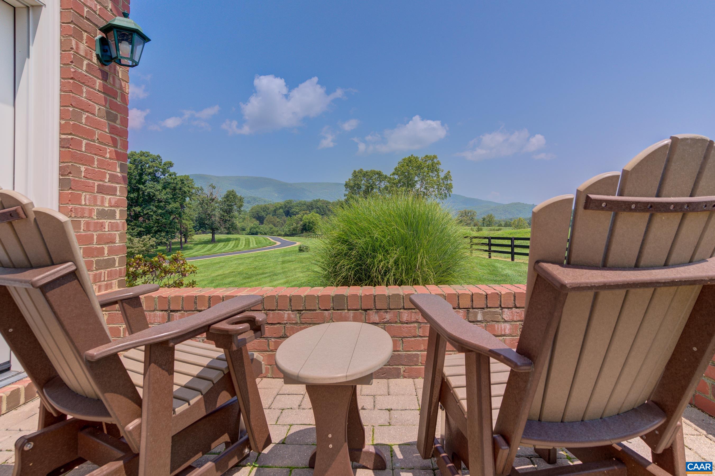 801 Half Mile Branch Road Crozet, VA 22932 - Photo 9 of 69 a view of a balcony with furniture