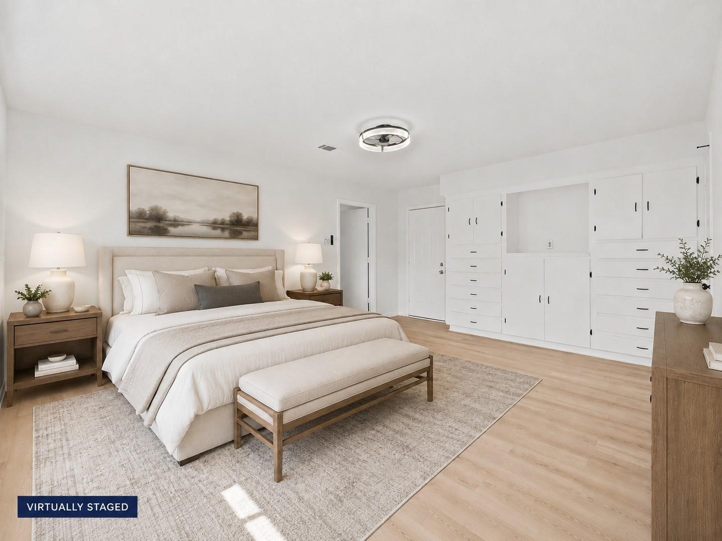 5762 Birdwood Road Houston, TX 77096 - Photo 24 of 49 THIS GENEROUSLY SIZED PRIMARY SUITE OFFERS BUILT IN DRAWERS AND CABINETS FOR ALL YOUR NEEDS.