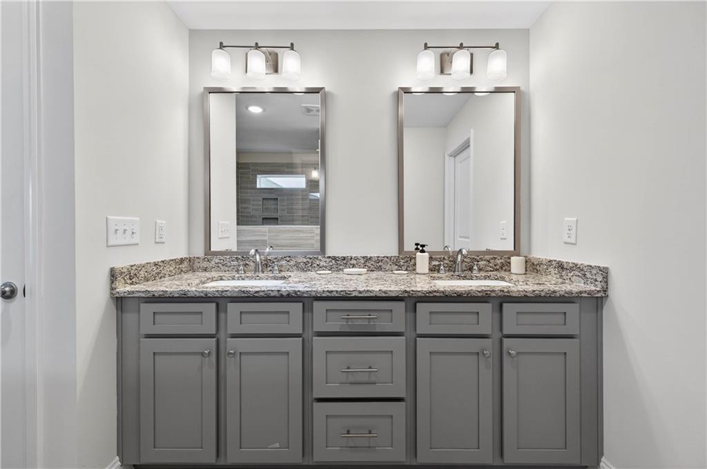 223 Timber Ridge Dawsonville, GA 30534 - Photo 13 of 24 a bathroom with a granite countertop sink and a mirror