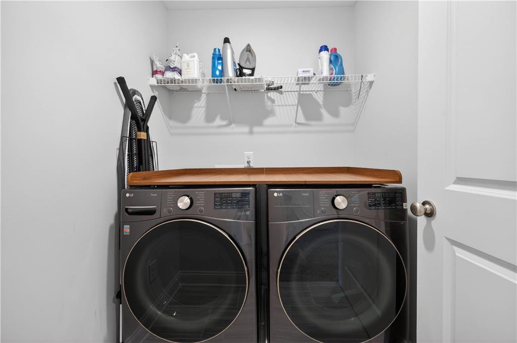 223 Timber Ridge Dawsonville, GA 30534 - Photo 20 of 24 a utility room with dryer and washer