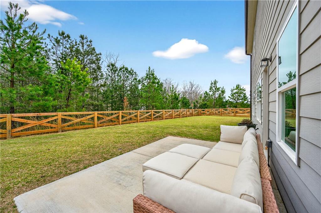 223 Timber Ridge Dawsonville, GA 30534 - Photo 22 of 24 a view of a swimming pool with a patio