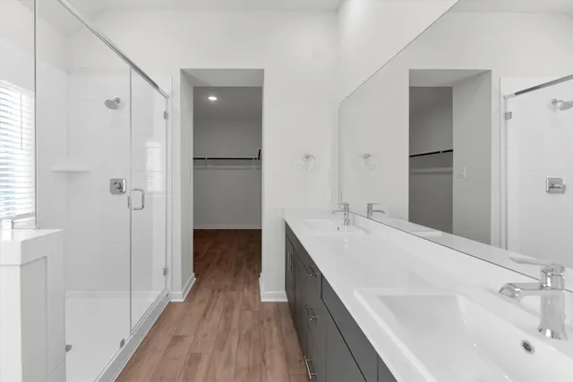 a bathroom with a bathtub and a sink