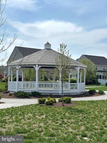 a view of street with houses