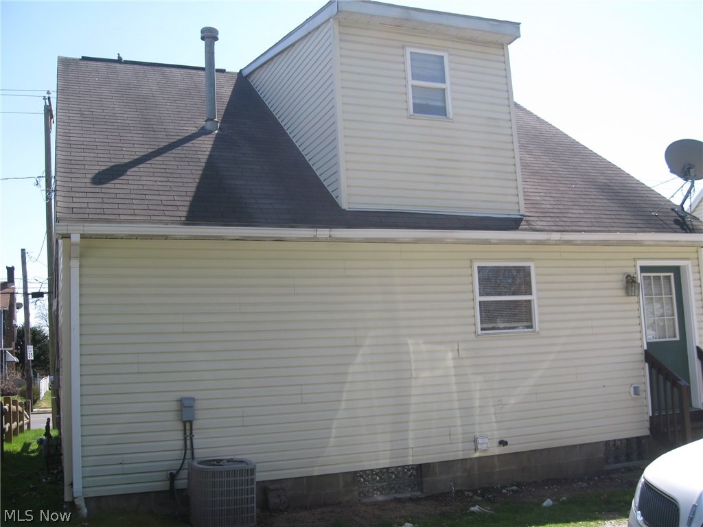 889 East Wilbeth Road Akron, OH 44306 - Photo 3 of 18 BACK VIEW OF HOME - - - - - - - -
