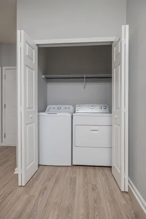 a utility room with dryer and washer