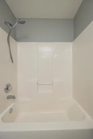 a bathroom with a bathtub