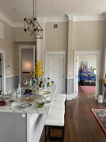 a view of a living room and dining room