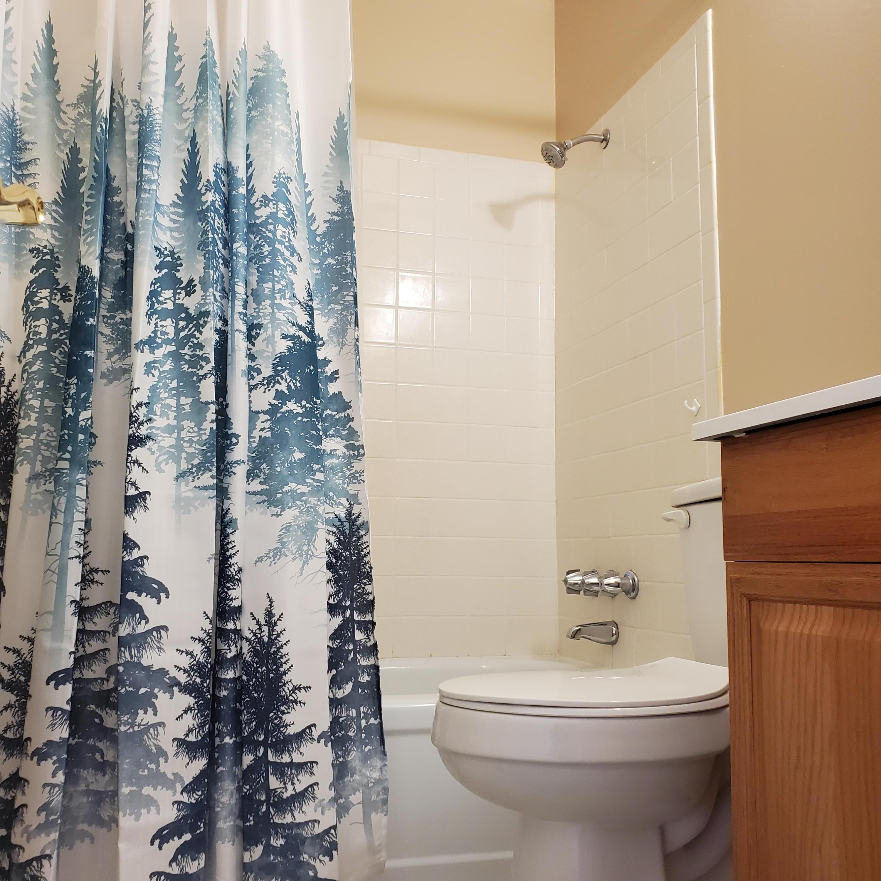 2600 Southeast Ocean Boulevard, Unit A11 Stuart, FL 34996 - Photo 12 of 62 a bathroom with a toilet sink and shower