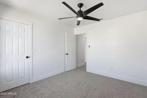 a view of an empty walk in closet