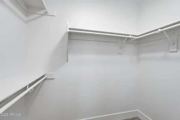 a bathroom with a sink a shower and a mirror