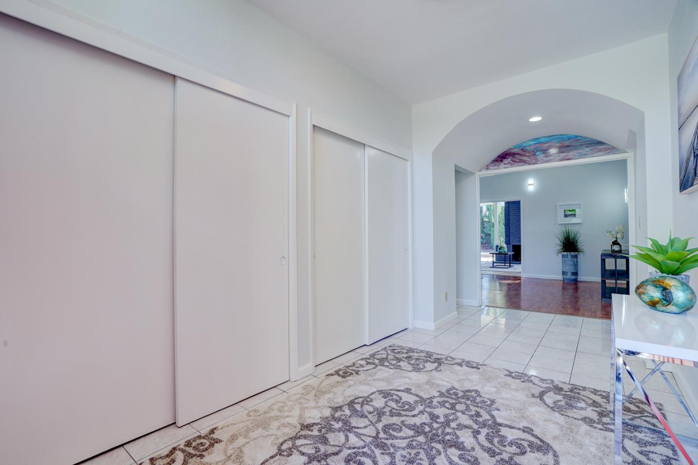 721 Stendhal Lane Cupertino, CA 95014 - Photo 12 of 54 a view of a hallway with wooden floor