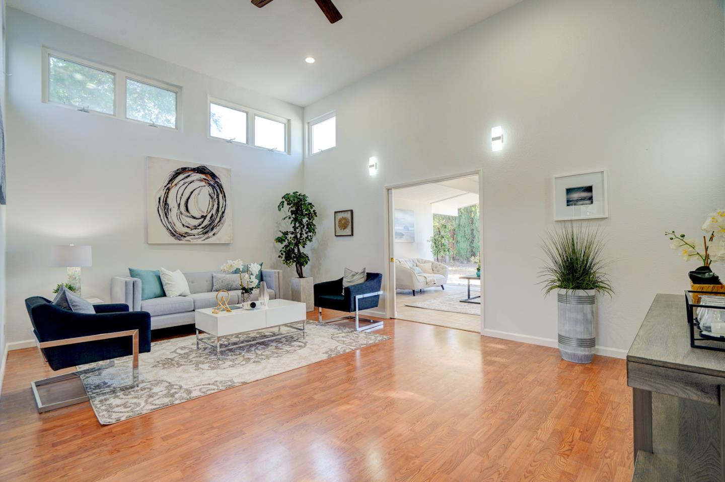 721 Stendhal Lane Cupertino, CA 95014 - Photo 14 of 54 a living room with furniture and a large window