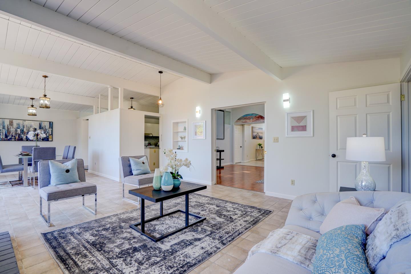 721 Stendhal Lane Cupertino, CA 95014 - Photo 18 of 54 a living room with furniture and a rug