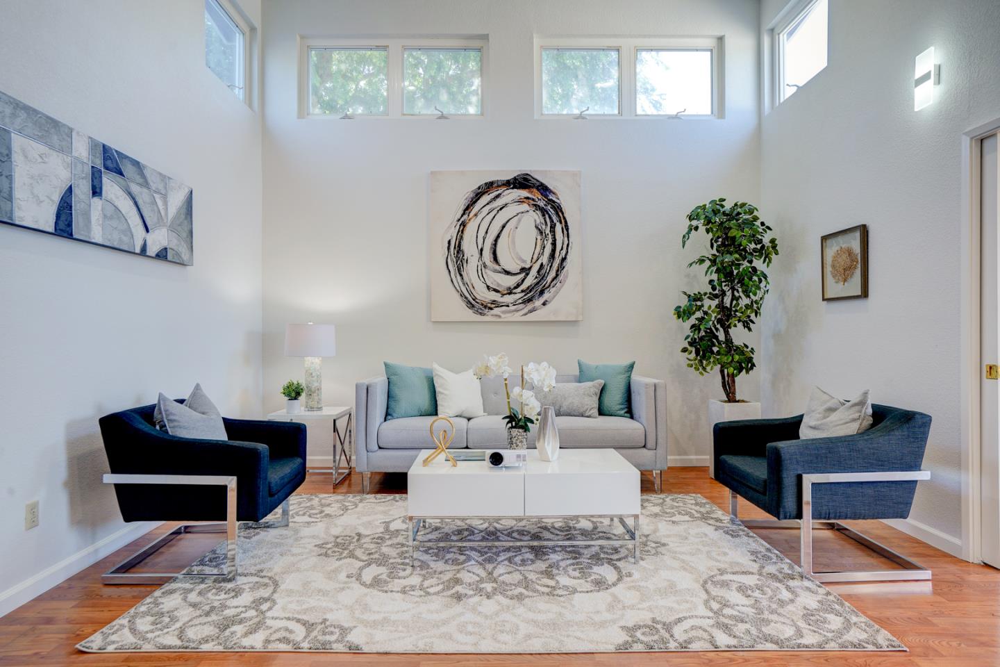 721 Stendhal Lane Cupertino, CA 95014 - Photo 2 of 54 a living room with furniture and a potted plant