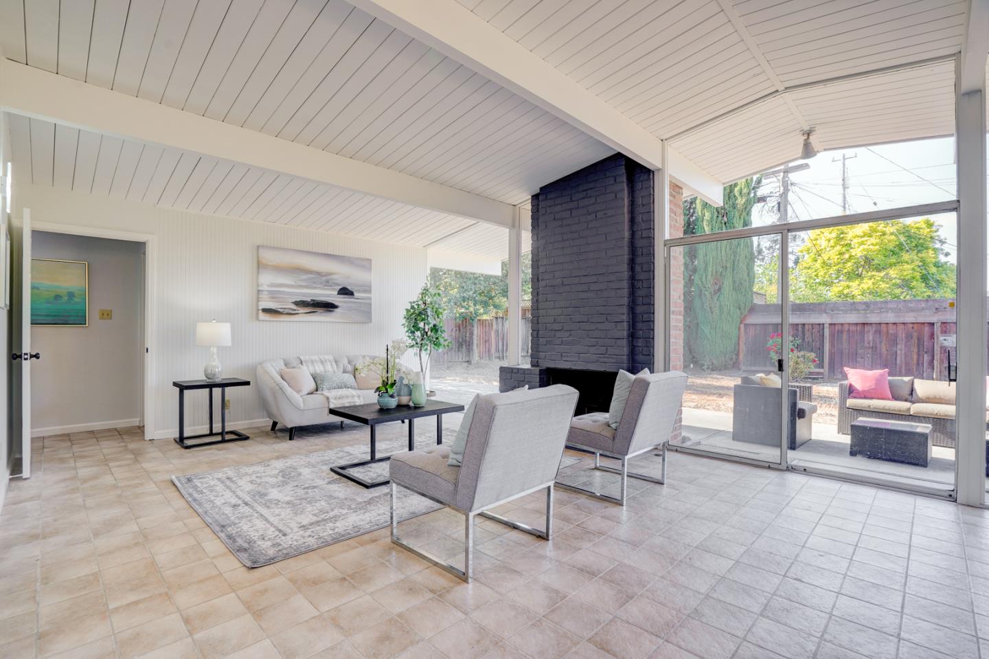 721 Stendhal Lane Cupertino, CA 95014 - Photo 21 of 54 a living room with furniture and a flat screen tv