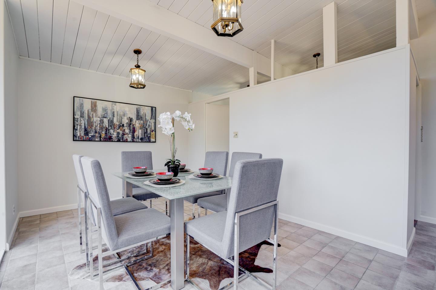 721 Stendhal Lane Cupertino, CA 95014 - Photo 22 of 54 a view of a dining room with furniture and chandelier