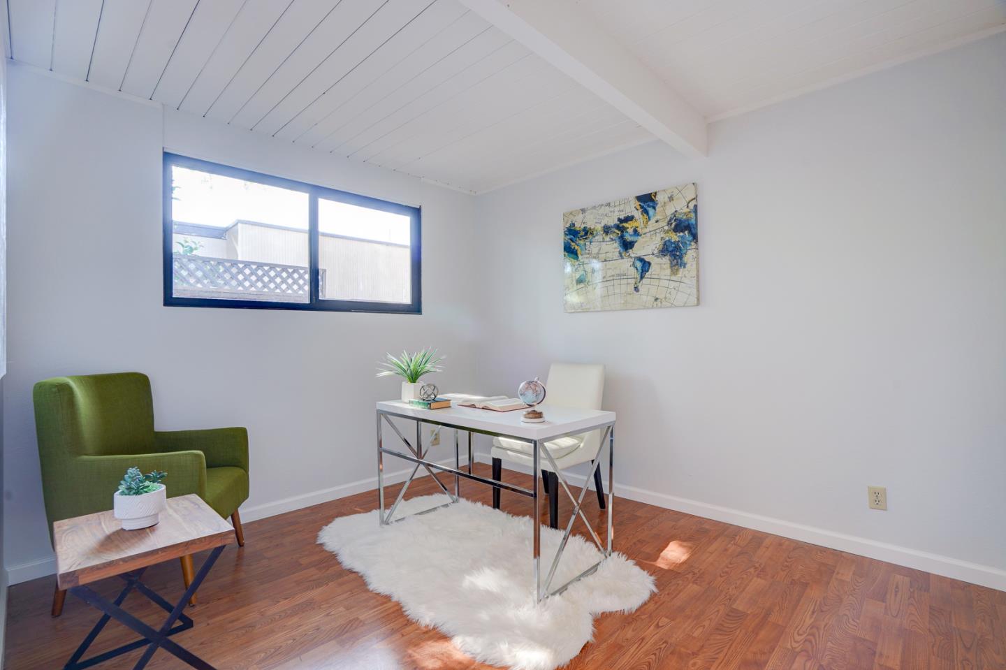 721 Stendhal Lane Cupertino, CA 95014 - Photo 33 of 54 a view of a workspace with furniture and wooden floor