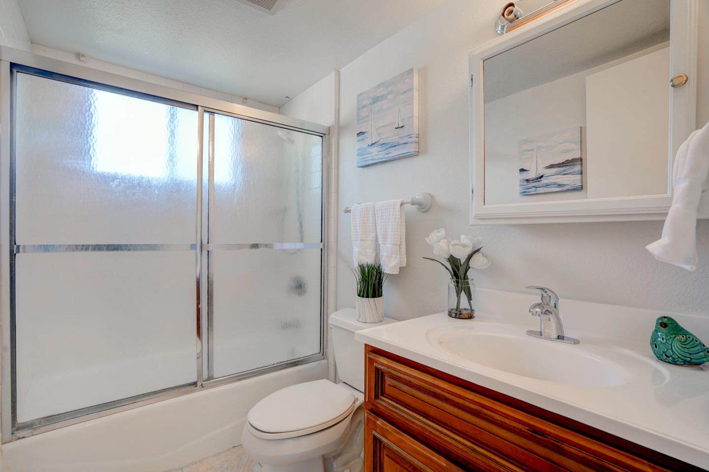 721 Stendhal Lane Cupertino, CA 95014 - Photo 37 of 54 a bathroom with a sink toilet and shower