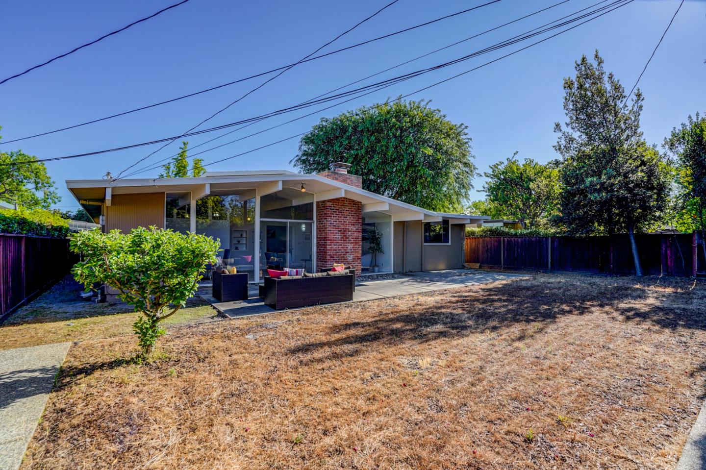 721 Stendhal Lane Cupertino, CA 95014 - Photo 47 of 54 a view of a house with backyard and sitting area