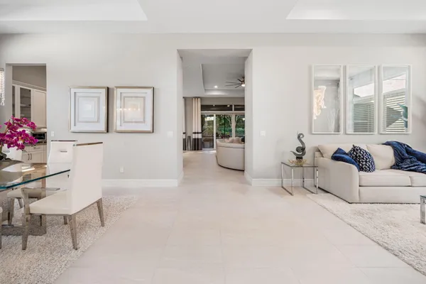 an aerial view of a city with lots of residential buildings lake and ocean view