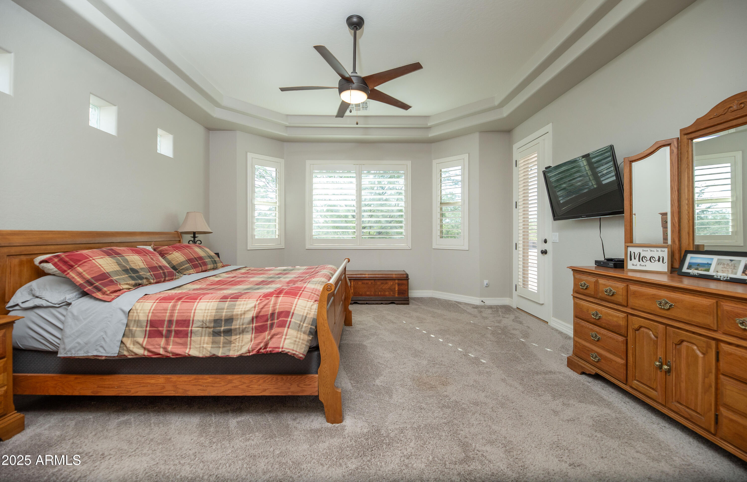 1532 North Roadrunner Road Apache Junction, AZ 85119 - Photo 12 of 51 a bedroom with a bed window and a flat screen tv