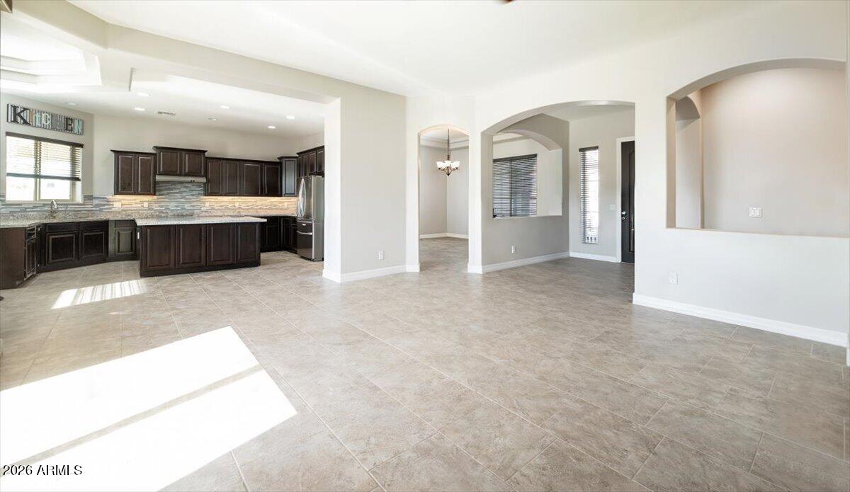 1532 North Roadrunner Road Apache Junction, AZ 85119 - Photo 13 of 54 a view of a kitchen with a sink and a large window