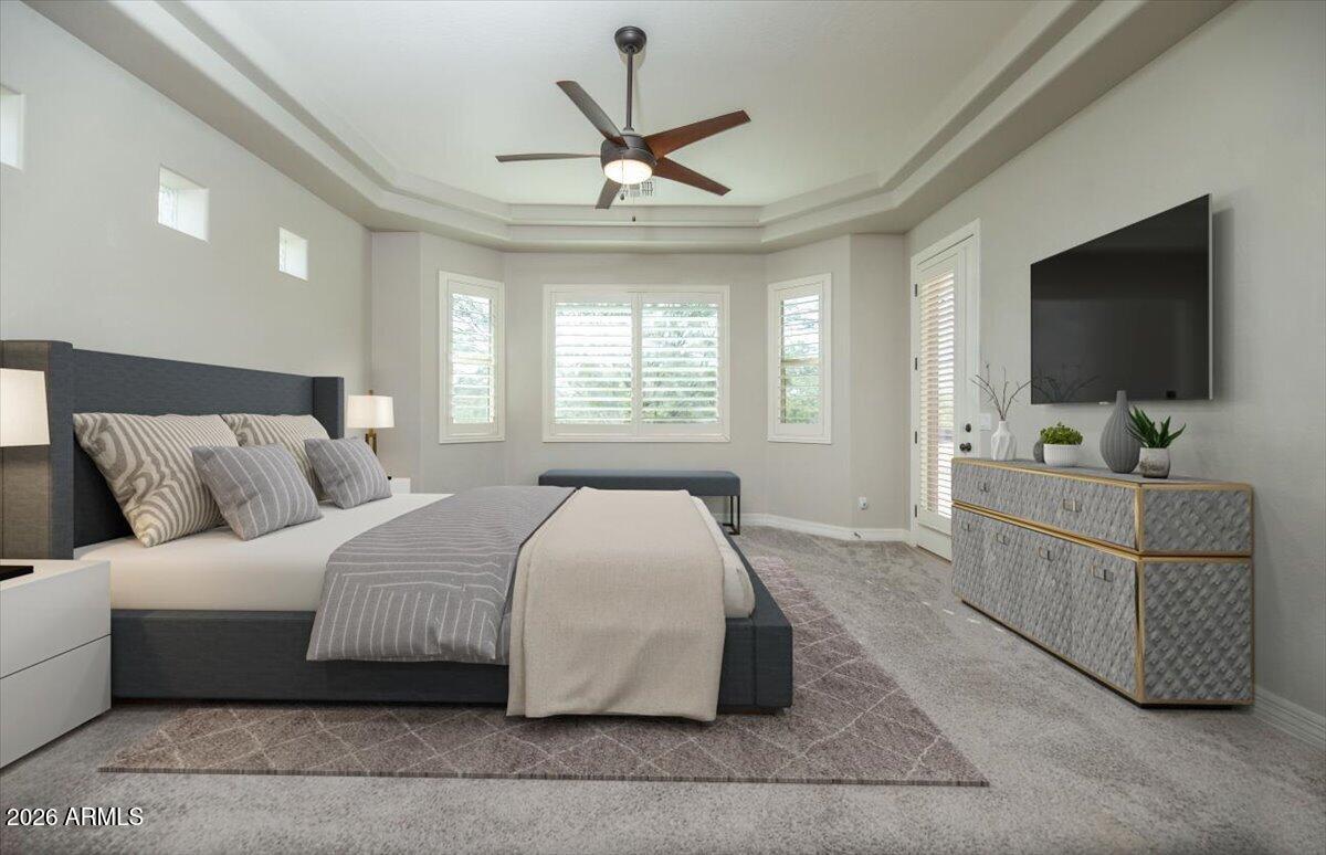 1532 North Roadrunner Road Apache Junction, AZ 85119 - Photo 14 of 55 a bedroom with a large bed and a flat screen tv