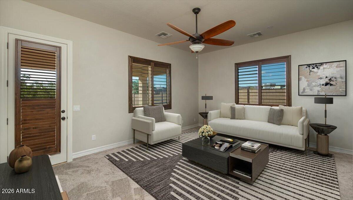 1532 North Roadrunner Road Apache Junction, AZ 85119 - Photo 21 of 54 a living room with furniture and a window