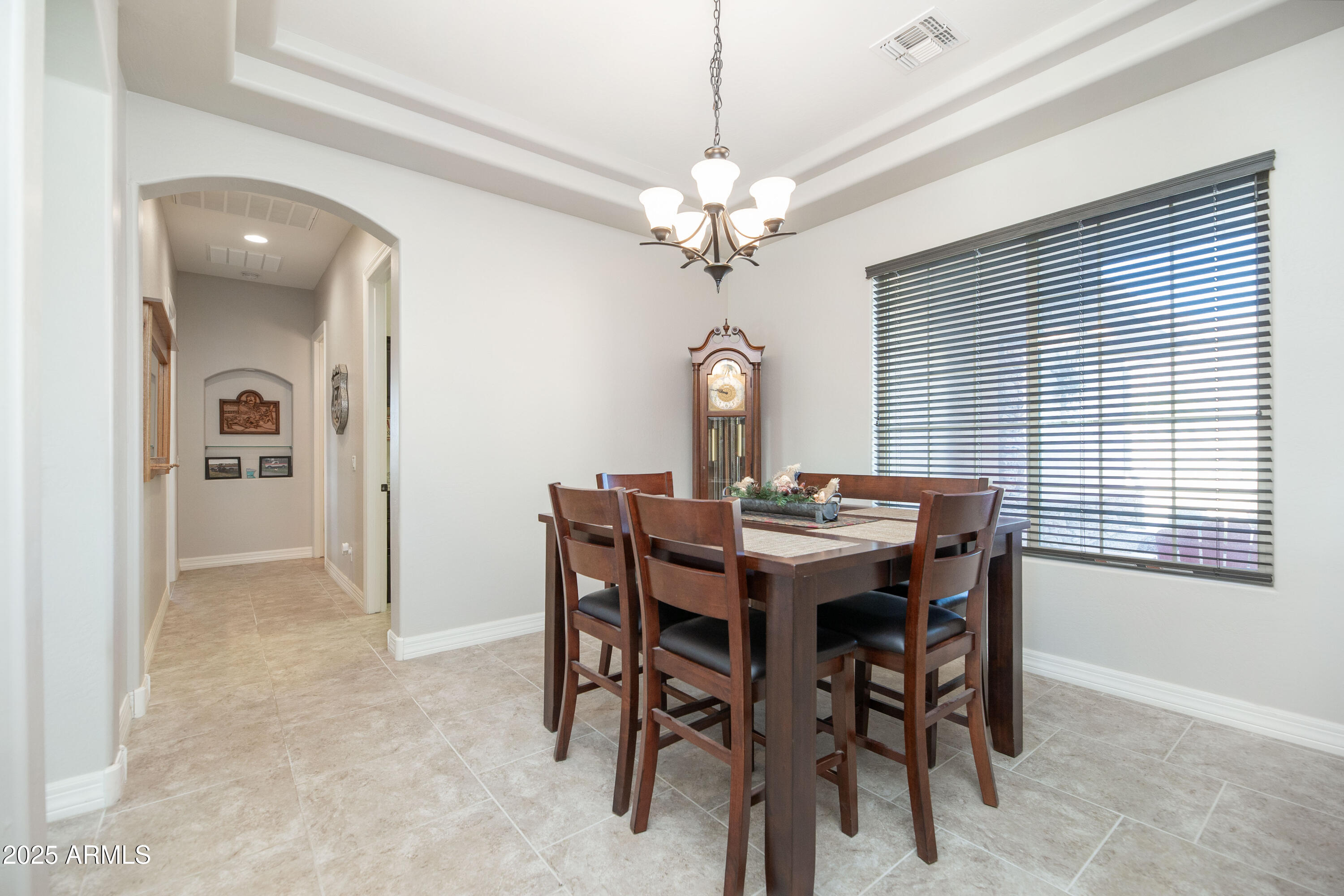 1532 North Roadrunner Road Apache Junction, AZ 85119 - Photo 29 of 51 a view of a dining room with furniture and chandelier