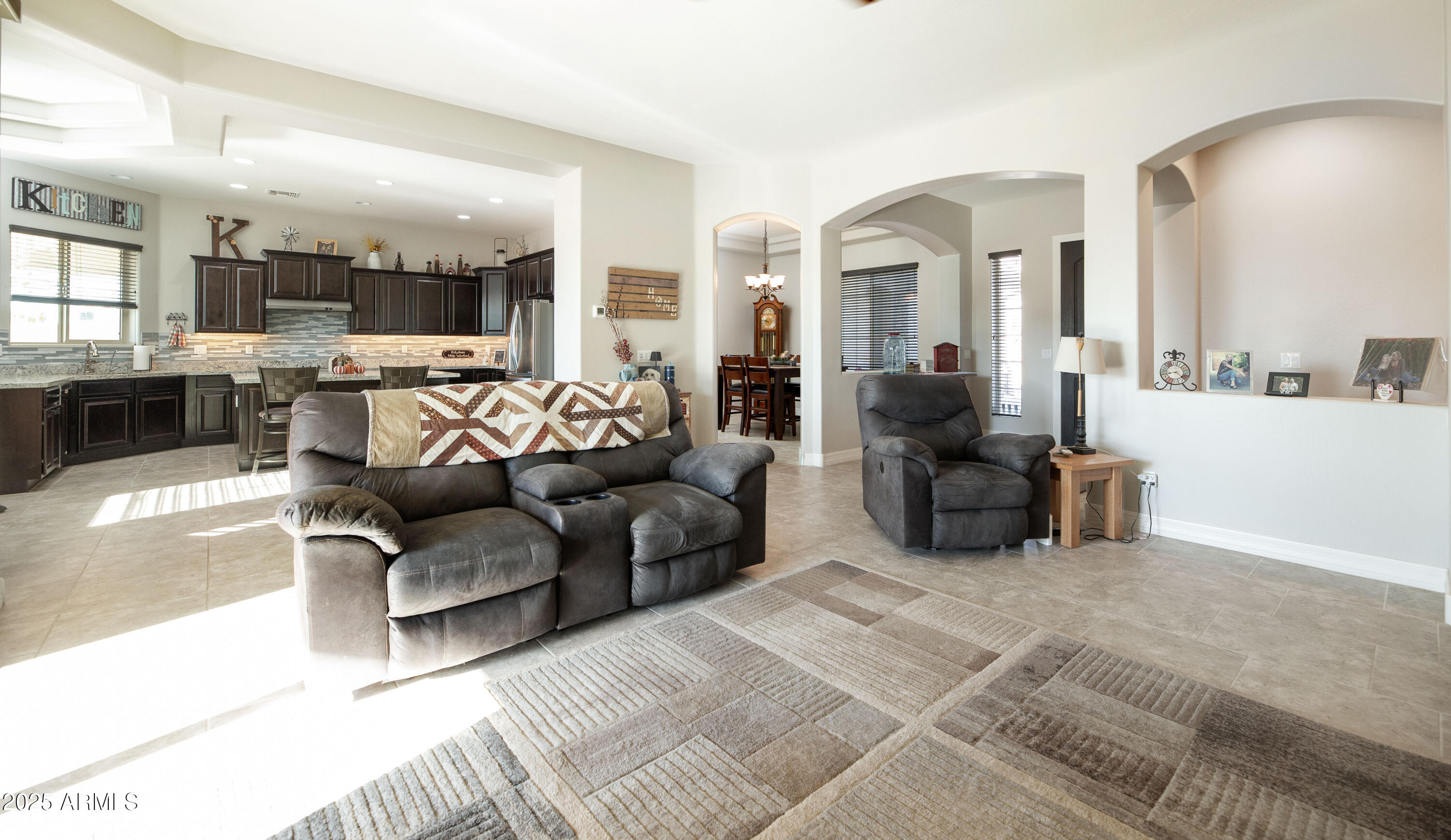 1532 North Roadrunner Road Apache Junction, AZ 85119 - Photo 31 of 51 a living room with furniture and a large window