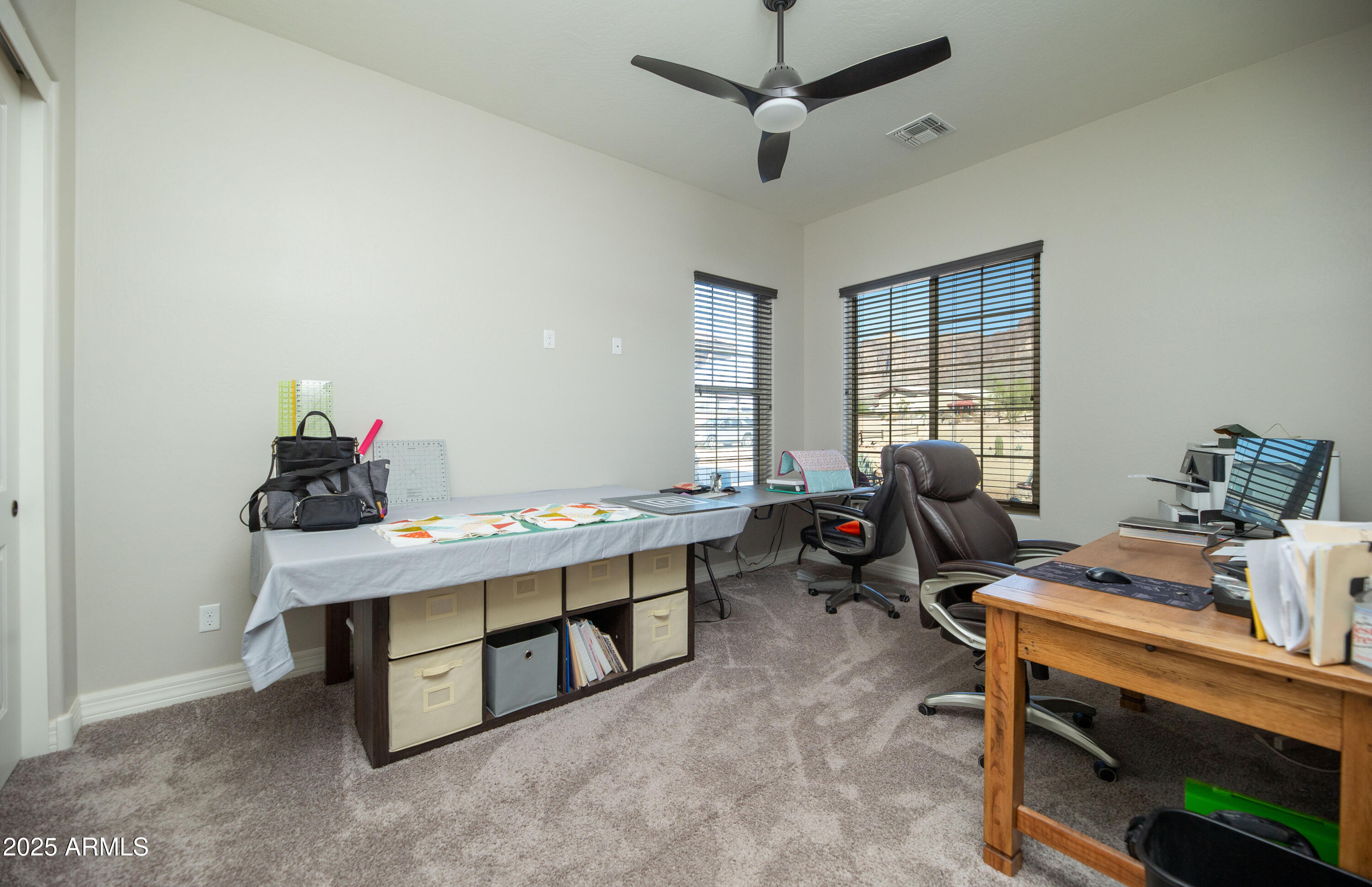1532 North Roadrunner Road Apache Junction, AZ 85119 - Photo 39 of 55 a view of a workspace with furniture and a window