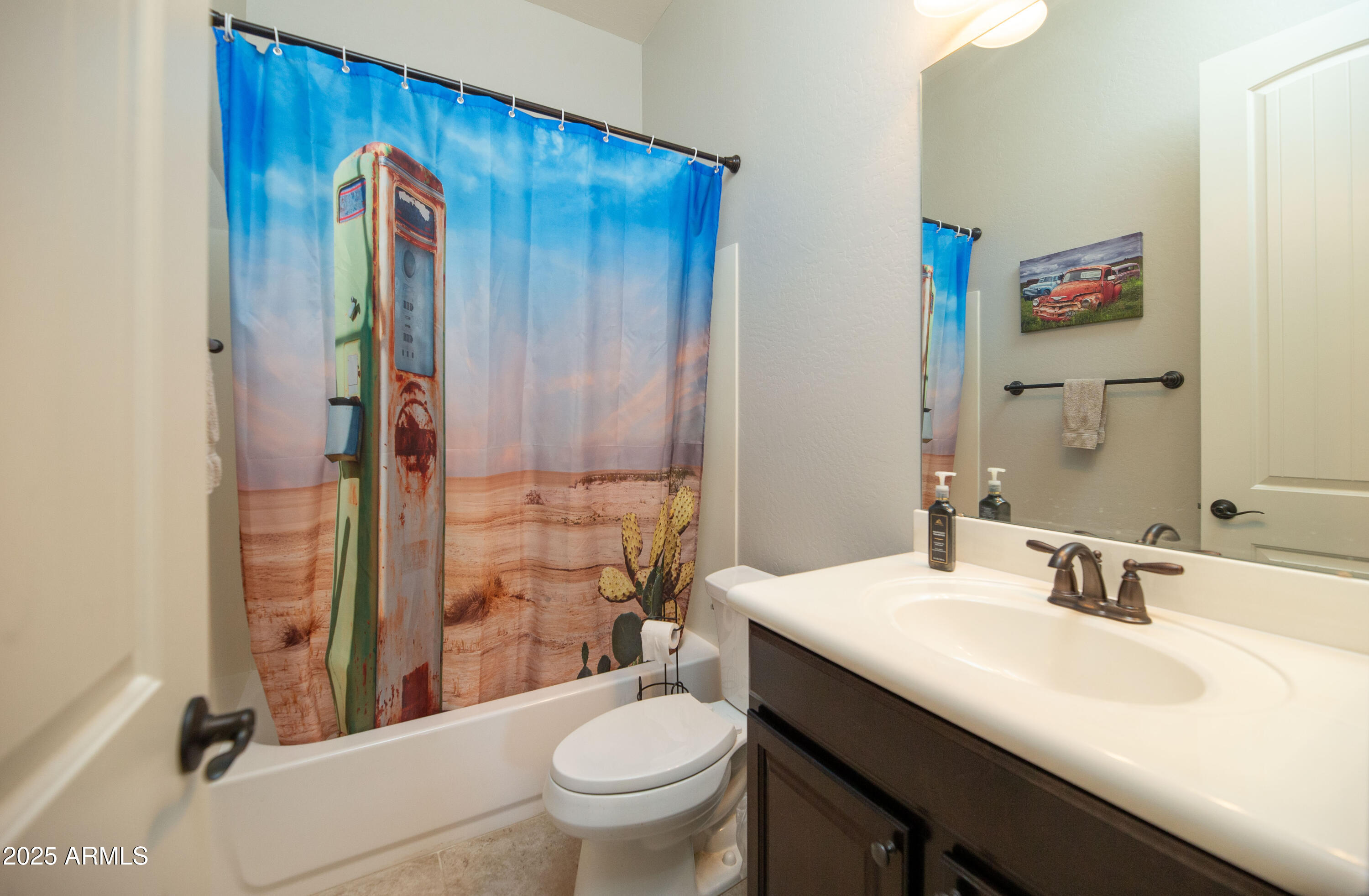 1532 North Roadrunner Road Apache Junction, AZ 85119 - Photo 43 of 55 a bathroom with a sink and a mirror