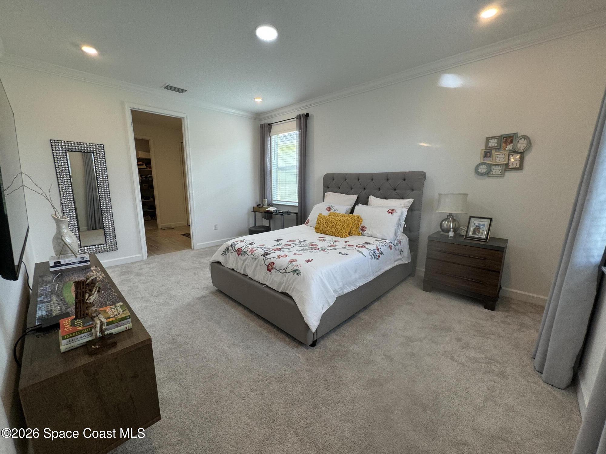 724 Veridian Circle Northwest Palm Bay, FL 32907 - Photo 5 of 16 Master bedroom
