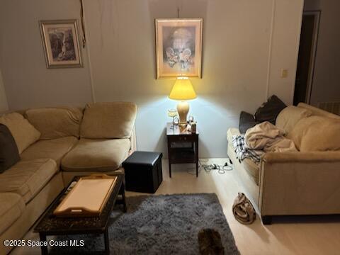 1965 Hammock Road Titusville, FL 32796 - Photo 4 of 12 a living room with furniture and a couch