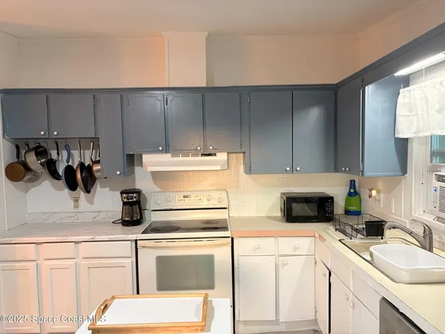 a bathroom with a sink and vanity
