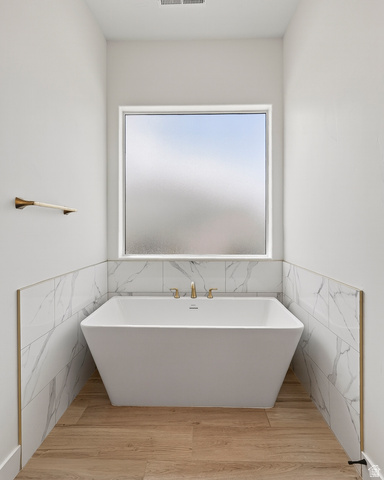 2862 South Mountain Rnch Road Cedar City, UT 84720 - Photo 25 of 64 Freestanding soaking tub with gold-tone fixtures