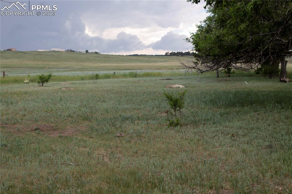 18 Sweet Road Calhan, CO 80808 - Photo 4 of 4 a view of a lake with a mountain in the background