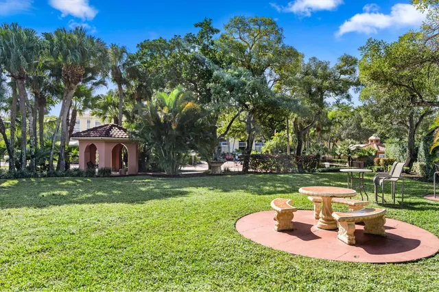a garden view with a seating space