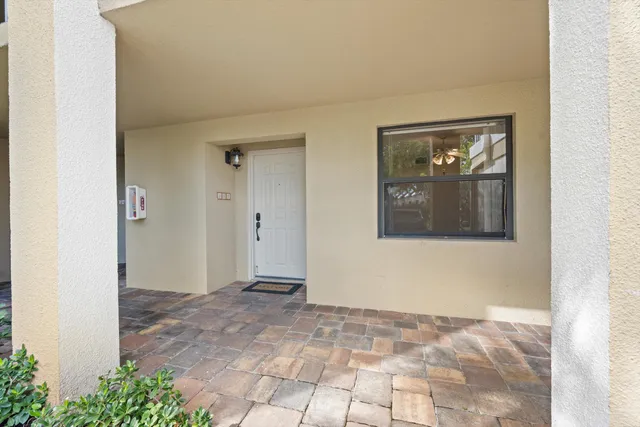an aerial view of residential building and lake